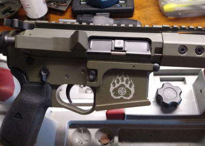 Custom Cerakoted AR with Grizzly Guns logo