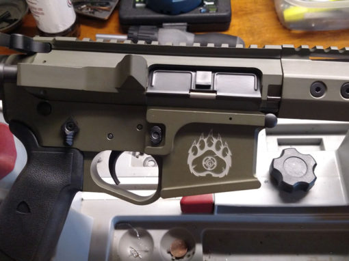 Custom Cerakoted AR with Grizzly Guns logo